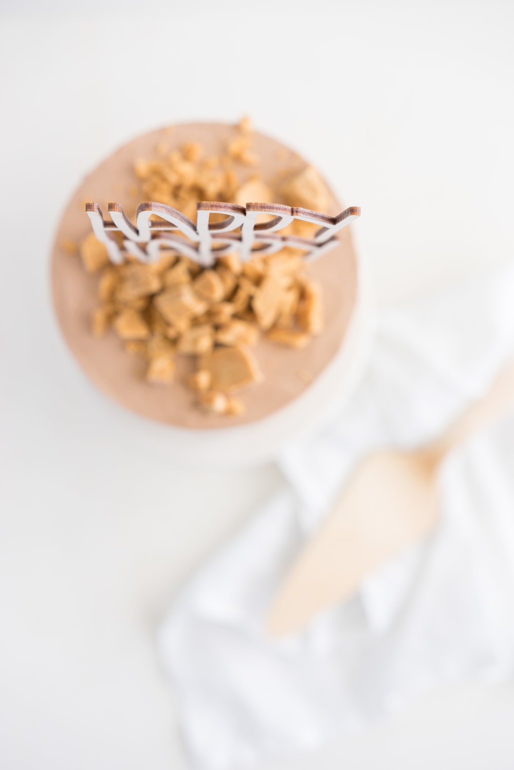 Peanut Butter Cake with Dark Chocolate Swiss Meringue Buttercream and Peanut Butter Crunch #cake #peanut butter