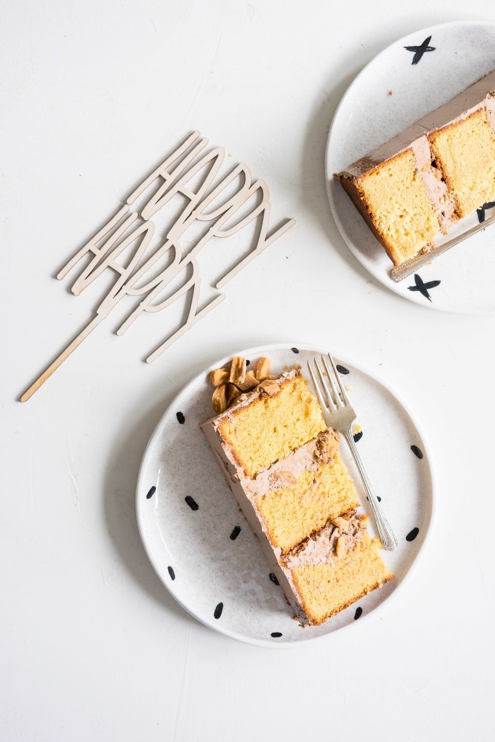 Peanut Butter Cake with Dark Chocolate Swiss Meringue Buttercream and Peanut Butter Crunch #cake #peanut butter