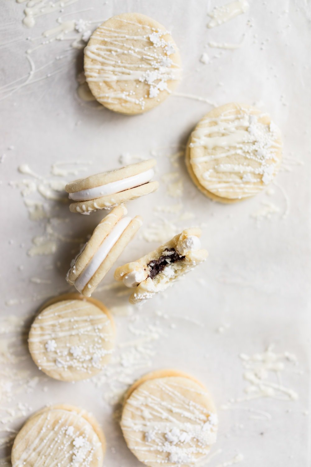Vanilla Sandwich Cookie with Vanilla bean Marshmallow and Dark Chocolate Ganache. The perfect Holiday cookie.