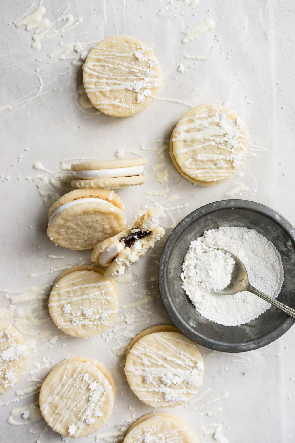 Vanilla Sandwich Cookie with Vanilla bean Marshmallow and Dark Chocolate Ganache. The perfect Holiday cookie.