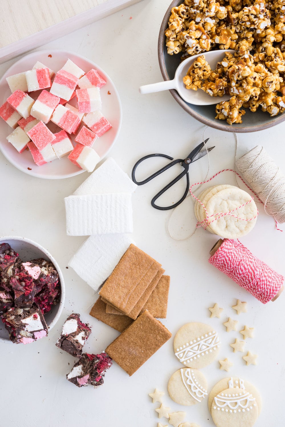 THE ultimate holiday cookie box - with something for everyone. Coconut ice, Honey Caramel Corn, sugar cookie marshmallow sandwiches, marshmallow and sugar cookie rocky road, piped roll out sugar cookies, and a DIY S'mores kit. What more could you wish for - this would be the perfect gift this holiday season.
