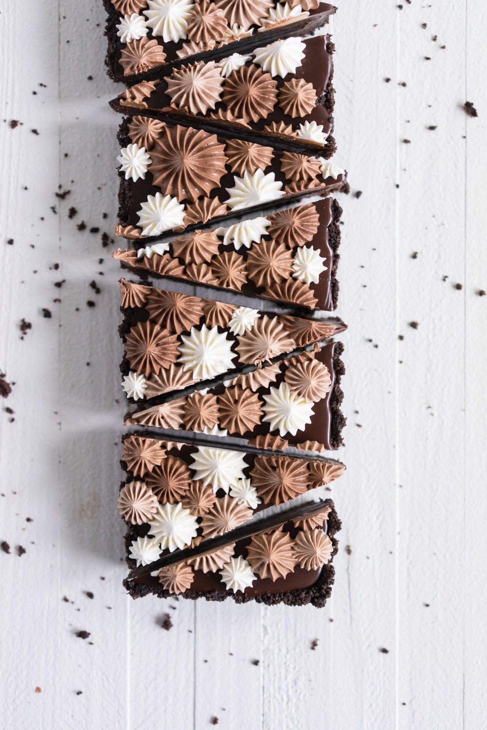 Milk Chocolate Earl Grey Tart with Ombre Dark Chocolate Swiss Meringue Buttercream. A press in cookie crust is topped with a silky earl grey infused ganache filling, then finished with an ombre swiss meringue buttercream.