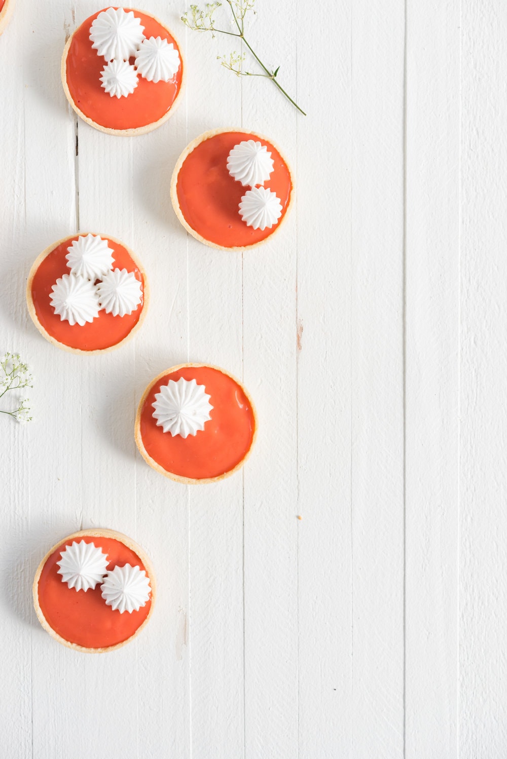 Blood orange meringue tart - sweet pastry filled with a blood orange curd and topped with a swiss meringue