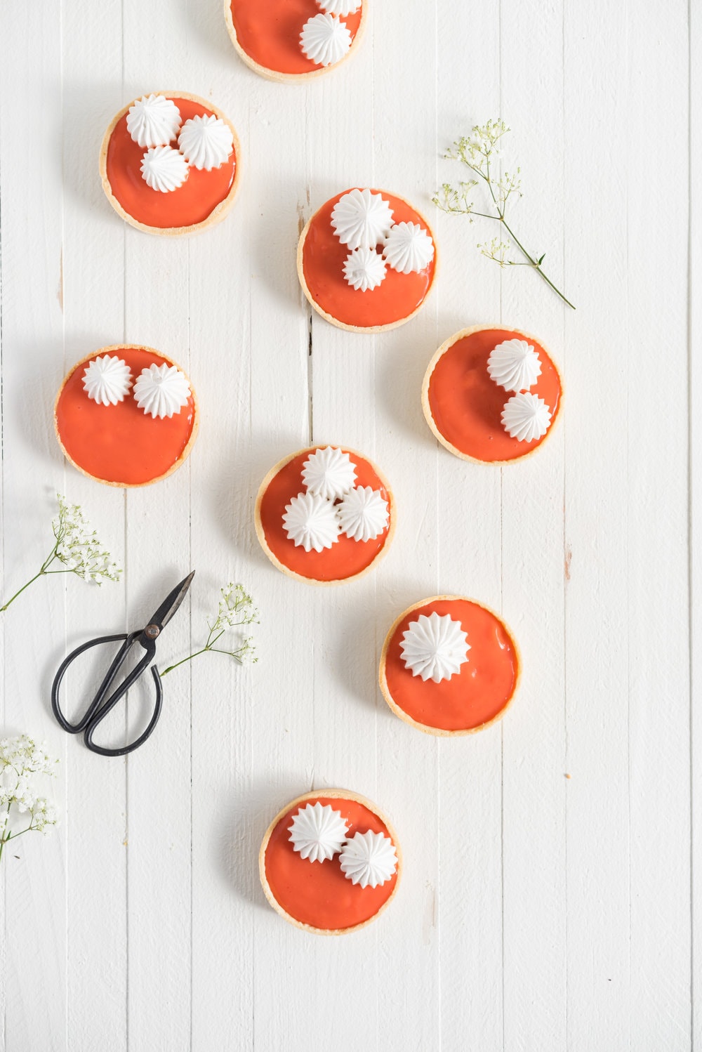 Blood orange meringue tart - sweet pastry filled with a blood orange curd and topped with a swiss meringue