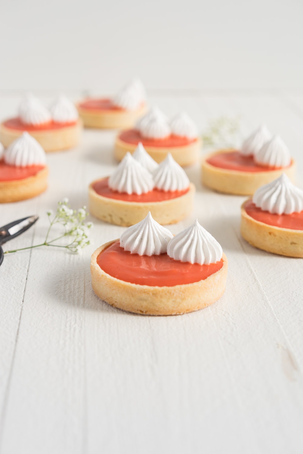Blood orange meringue tart - sweet pastry filled with a blood orange curd and topped with a swiss meringue