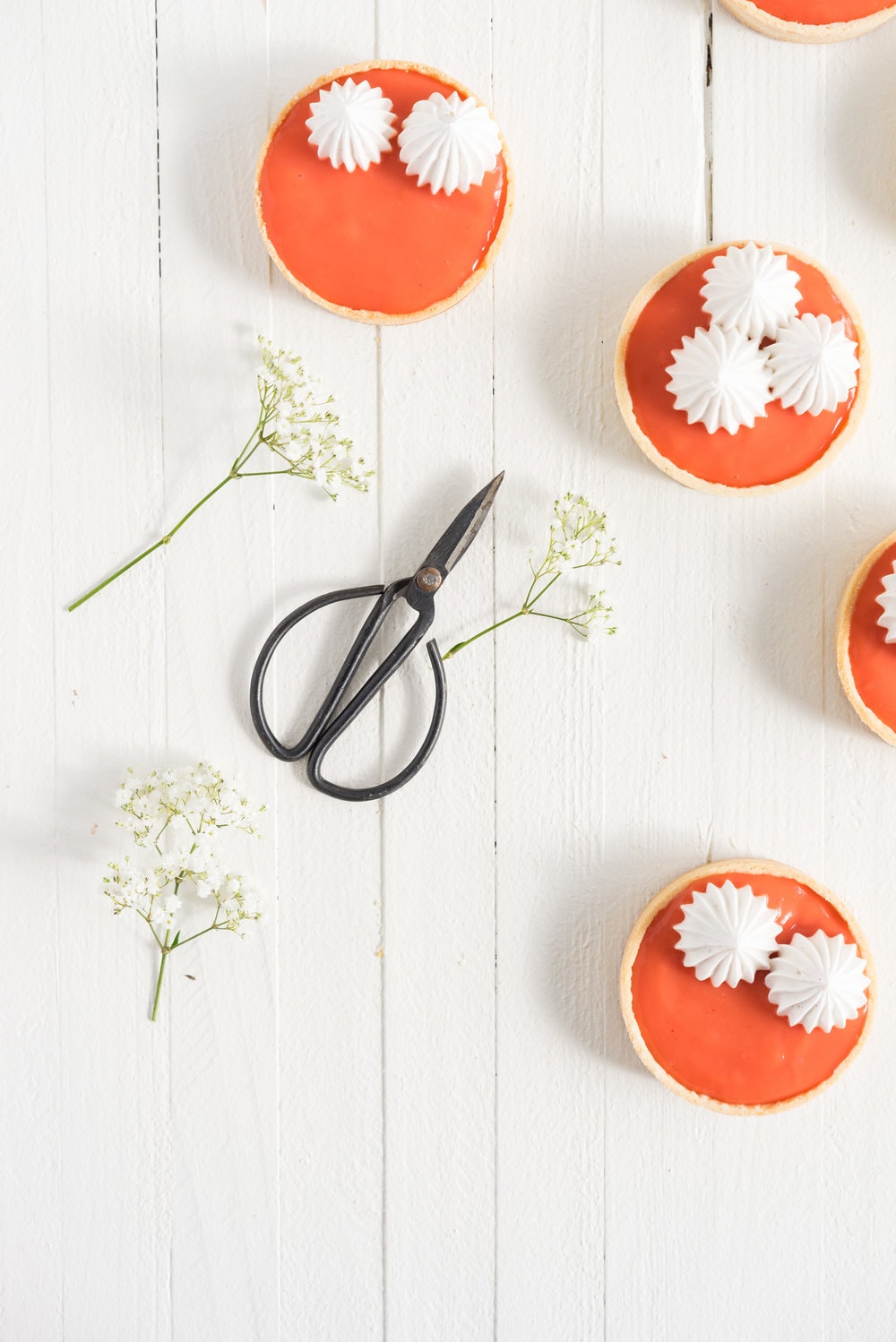 Blood orange meringue tart - sweet pastry filled with a blood orange curd and topped with a swiss meringue