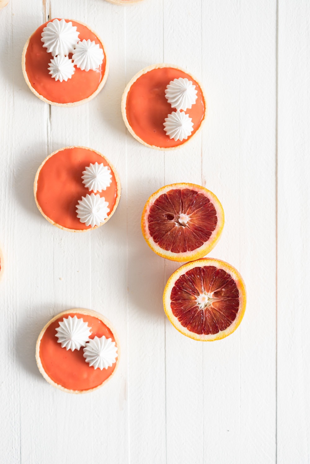 Blood orange meringue tart - sweet pastry filled with a blood orange curd and topped with a swiss meringue