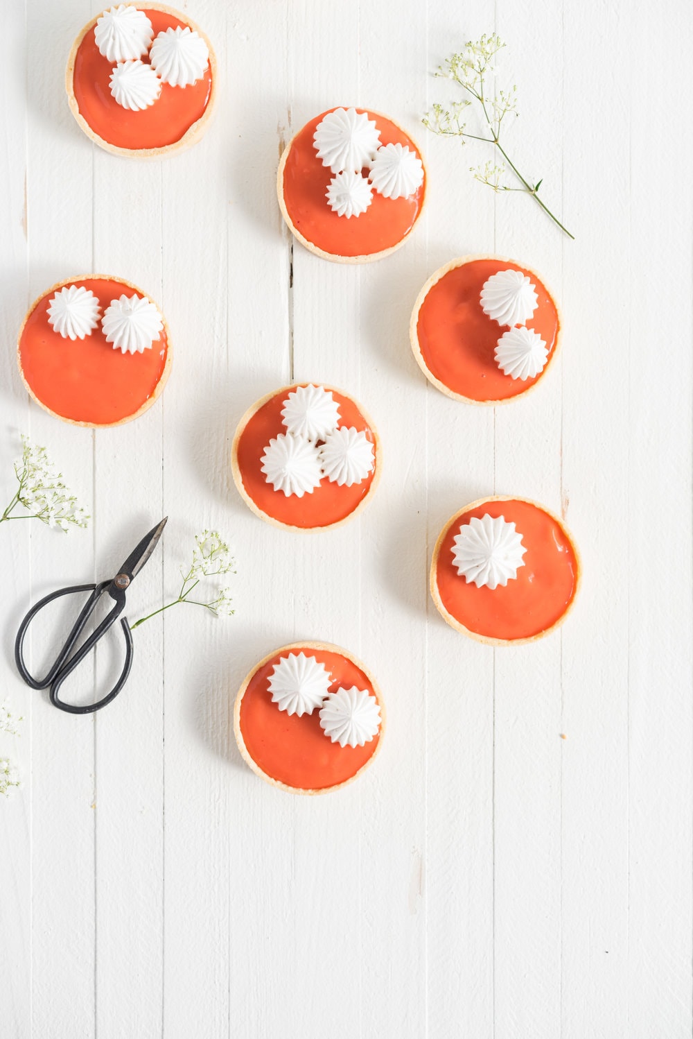 Blood orange meringue tart - sweet pastry filled with a blood orange curd and topped with a swiss meringue