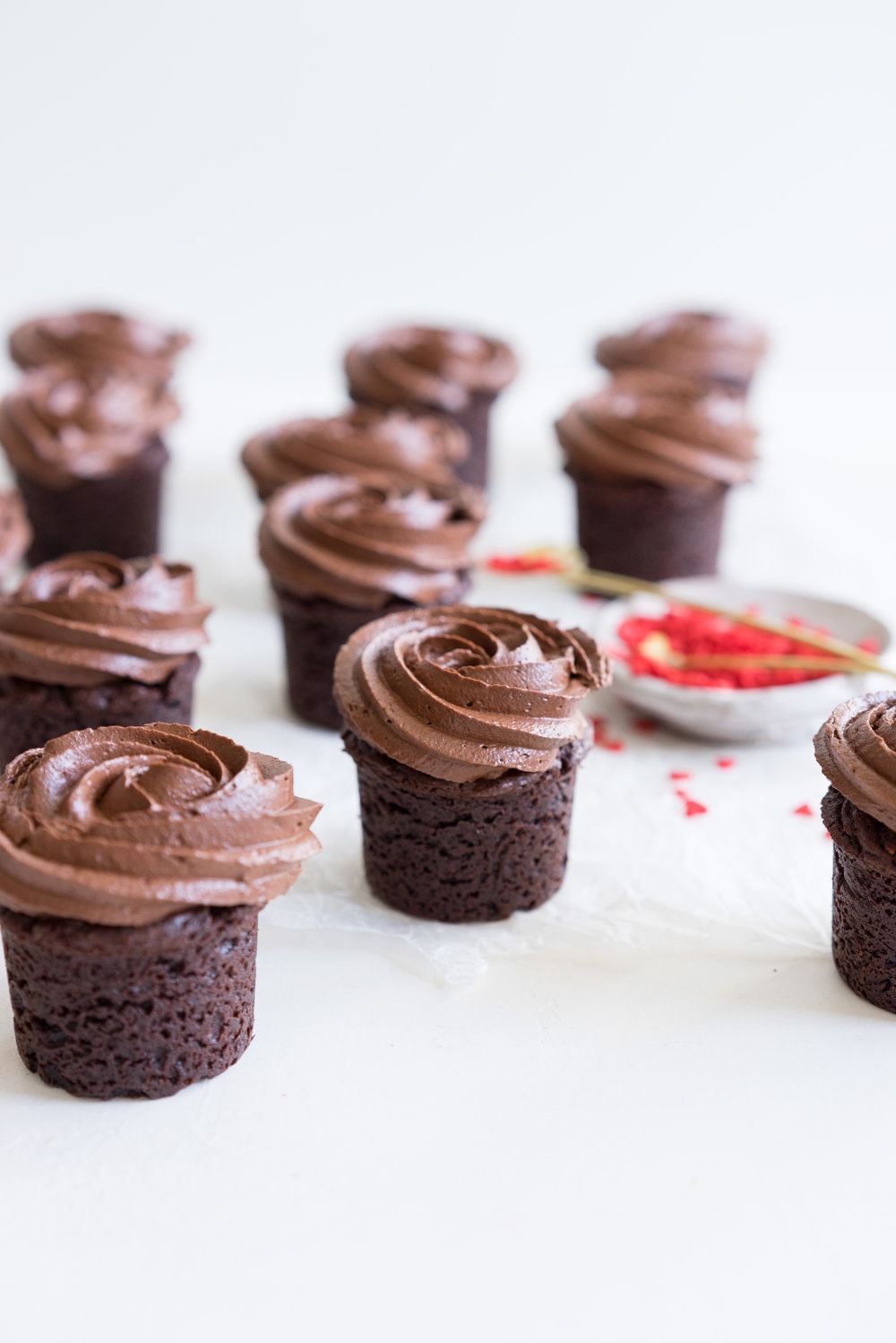 Hazelnut Brownie Bites with Dark Chocolate Hazelnut frosting. A dozen roses AND chocolate all in one go - you win valentines.