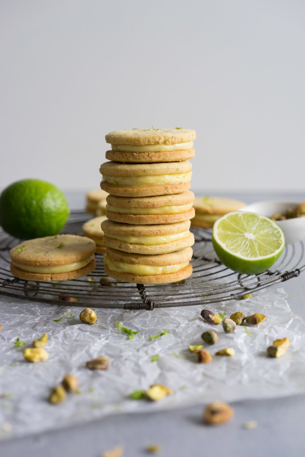 Buttery Pistachio and lime shortbread, sandwiched with a zesty lime cream. #shortbread #lime #Sandwichcookie