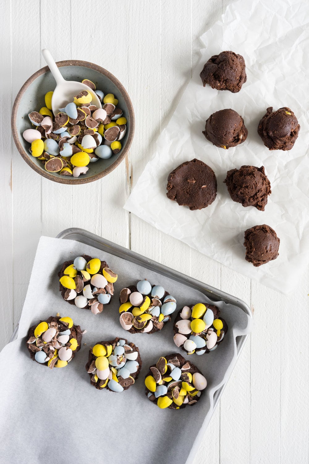 Milk Chocolate Mini Egg Cookies - the perfect addition to your easter baking schedule. These come together quickly, are super fun to make, and insanely delicious. Fudgy and chewy, chocolately and crispy, and loaded up with mini eggs.