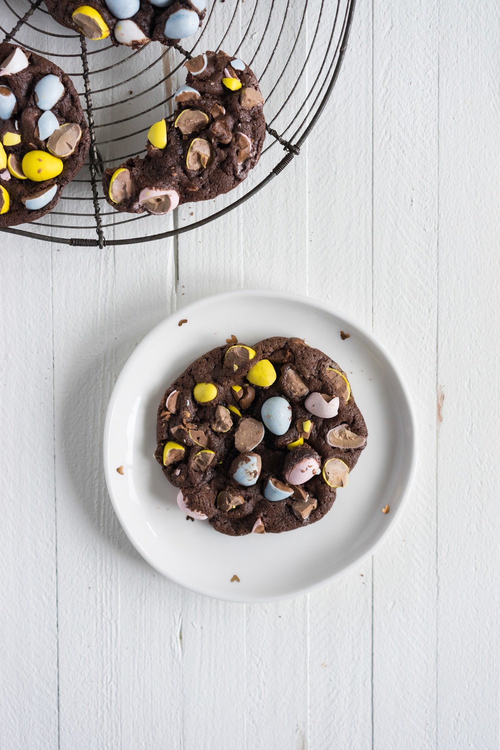 Milk Chocolate Mini Egg Cookies - the perfect addition to your easter baking schedule. These come together quickly, are super fun to make, and insanely delicious. Fudgy and chewy, chocolately and crispy, and loaded up with mini eggs.