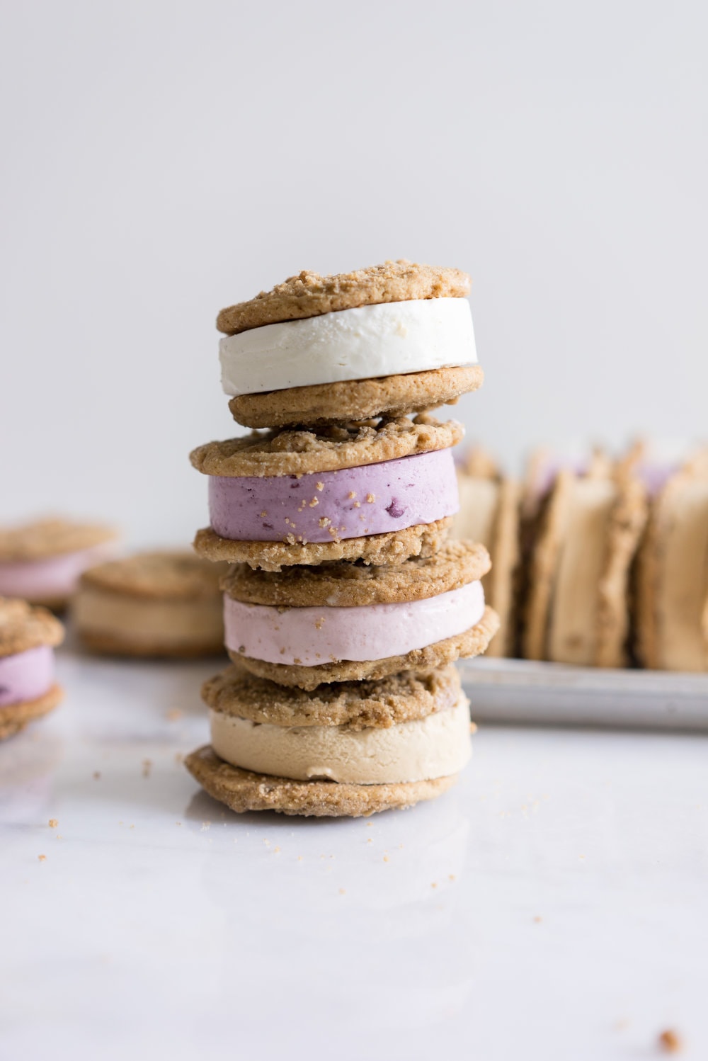 Frozen Yogurt Cookie Sandwiches with Brown Butter Streusel cookies from Cloudy Kitchen. Streusel Cookies sandwich a creamy, dreamy frozen yogurt, which is incredibly easy to whip up, and requires no straining of the yogurt! #frozenyogurt #frozenyoghurt #cookiesandwich