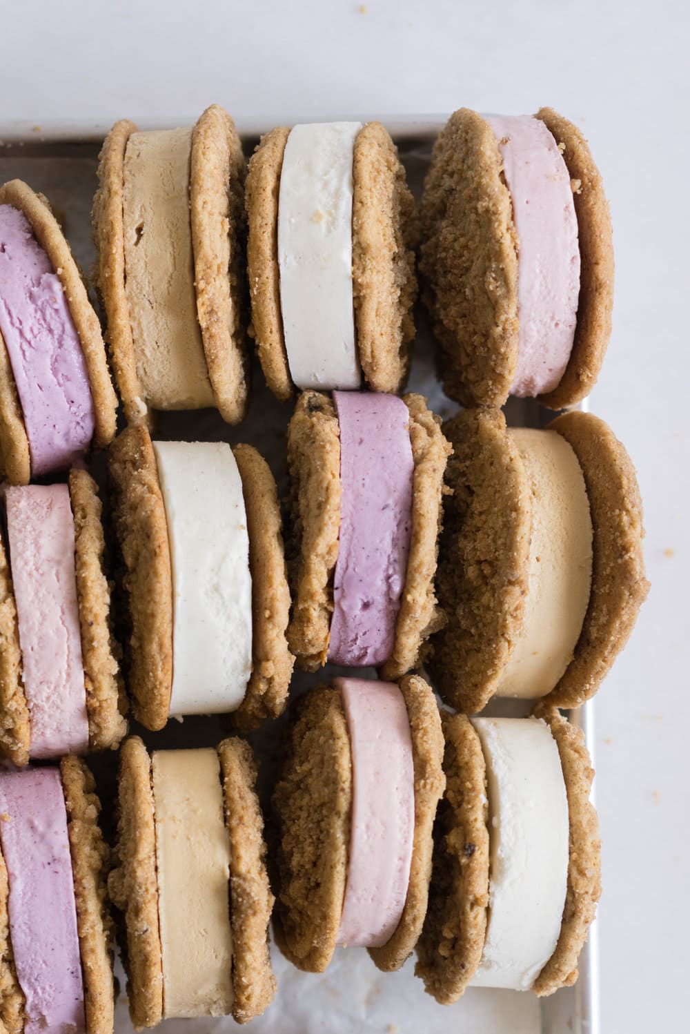Frozen Yogurt Cookie Sandwiches with Brown Butter Streusel cookies from Cloudy Kitchen. Streusel Cookies sandwich a creamy, dreamy frozen yogurt, which is incredibly easy to whip up, and requires no straining of the yogurt! #frozenyogurt #frozenyoghurt #cookiesandwich