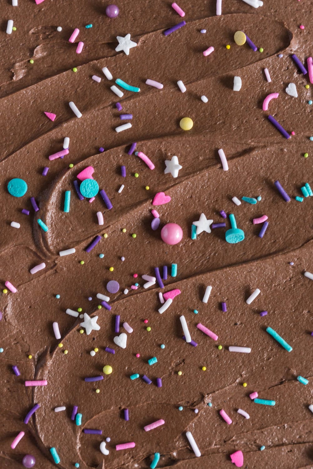 Chocolate Snack Cake with Chocolate Buttercream - the perfect cake recipe to have in your back pocket. Tender chocolate cake topped with fluffy chocolate buttercream #chocolatecake #snackcake