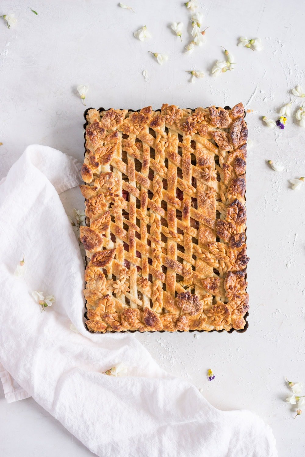 Rhubarb Frangipane Slab Pie - Flaky tender pie crust, sweet nutty frangipane, and vanilla infused roasted rhubarb. Perfect Spring or Early Summer Pie