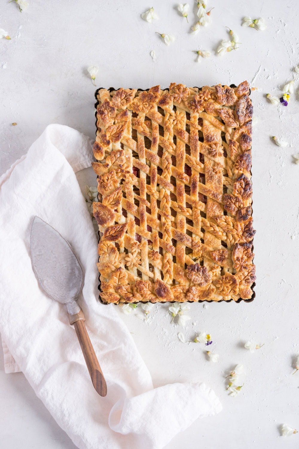 Rhubarb Frangipane Slab Pie - Flaky tender pie crust, sweet nutty frangipane, and vanilla infused roasted rhubarb. Perfect Spring or Early Summer Pie