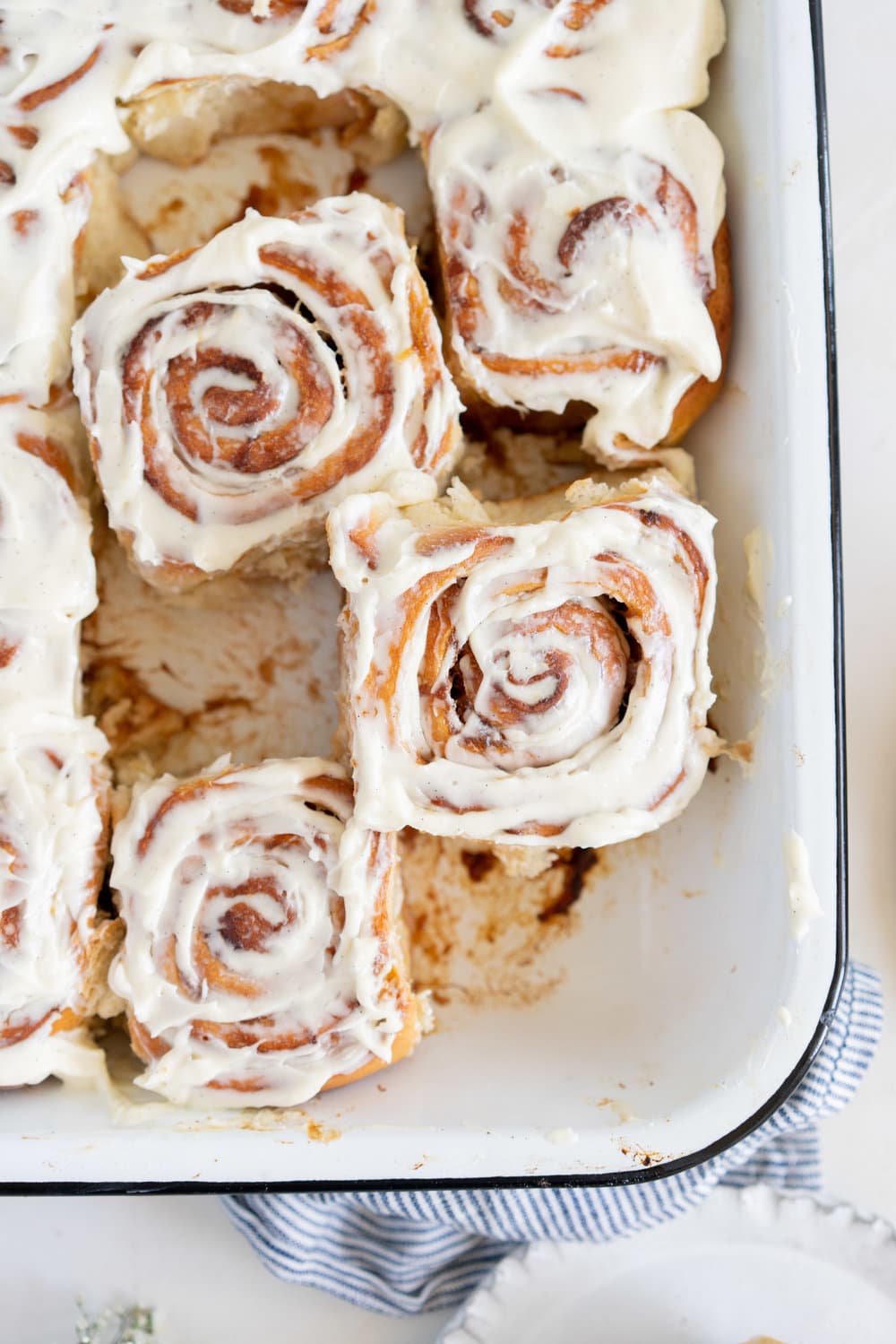Rhubarb Sticky Buns - Brioche Spiked with vanilla, filled with rhubarb quick jam, and finished with a vanilla bean mascarpone frosting. #stickybuns #rhubarb #vanillabean #cloudykitchen