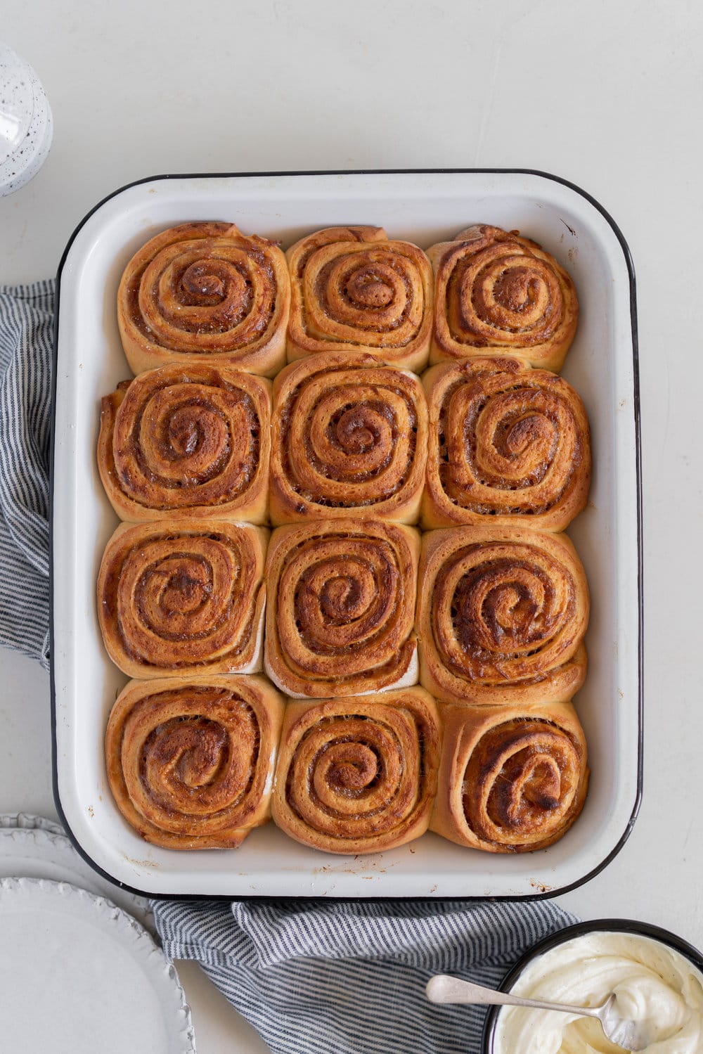 Rhubarb Sticky Buns - Brioche Spiked with vanilla, filled with rhubarb quick jam, and finished with a vanilla bean mascarpone frosting. #stickybuns #rhubarb #vanillabean #cloudykitchen