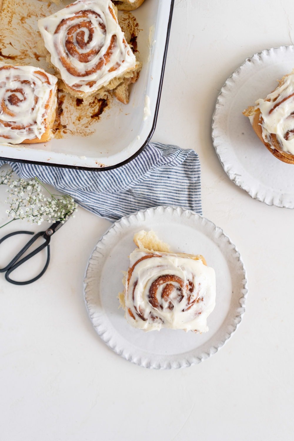 Rhubarb Sticky Buns - Brioche Spiked with vanilla, filled with rhubarb quick jam, and finished with a vanilla bean mascarpone frosting. #stickybuns #rhubarb #vanillabean #cloudykitchen