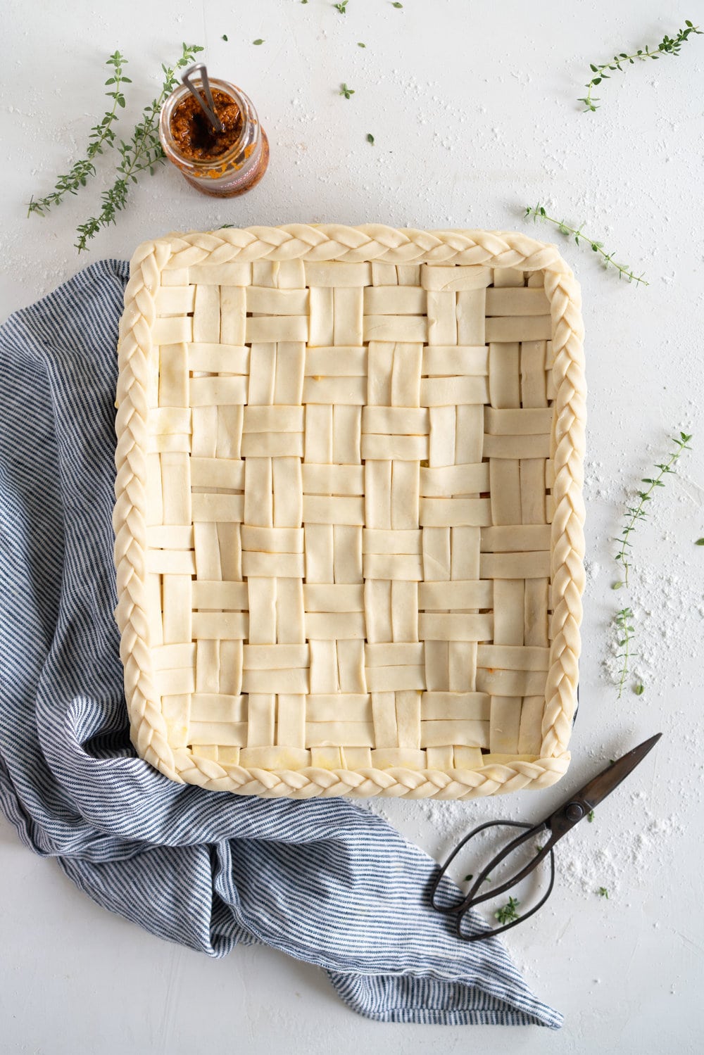 Chicken, Leek and Sun dried Tomato Pesto Pie with Homemade Rough Puff Pastry - creamy chicken and leek filling is tucked into a flaky tender homemade rough puff pastry. Perfect to feed a crowd.