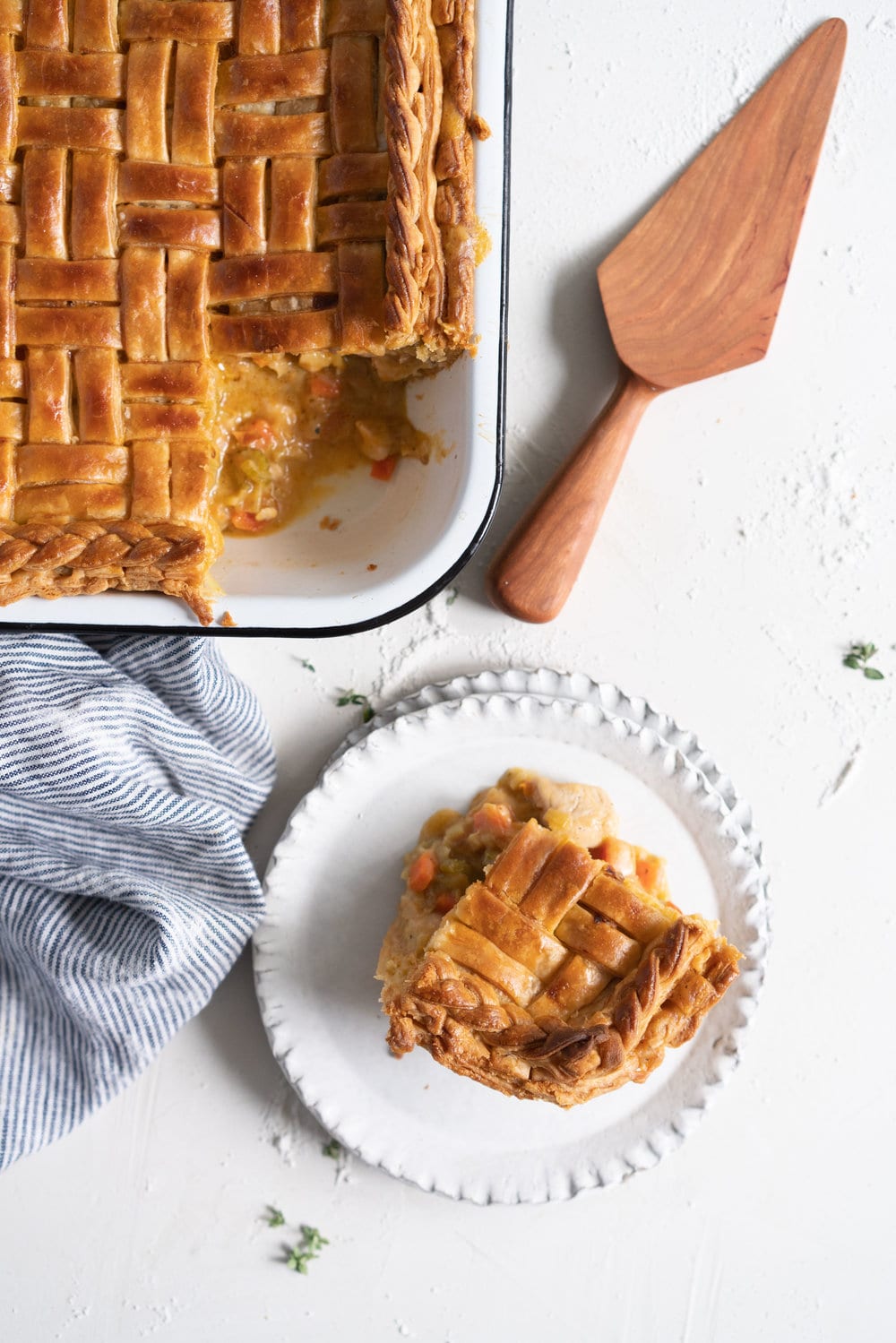 Chicken, Leek and Sun dried Tomato Pesto Pie with Homemade Rough Puff Pastry - creamy chicken and leek filling is tucked into a flaky tender homemade rough puff pastry. Perfect to feed a crowd.