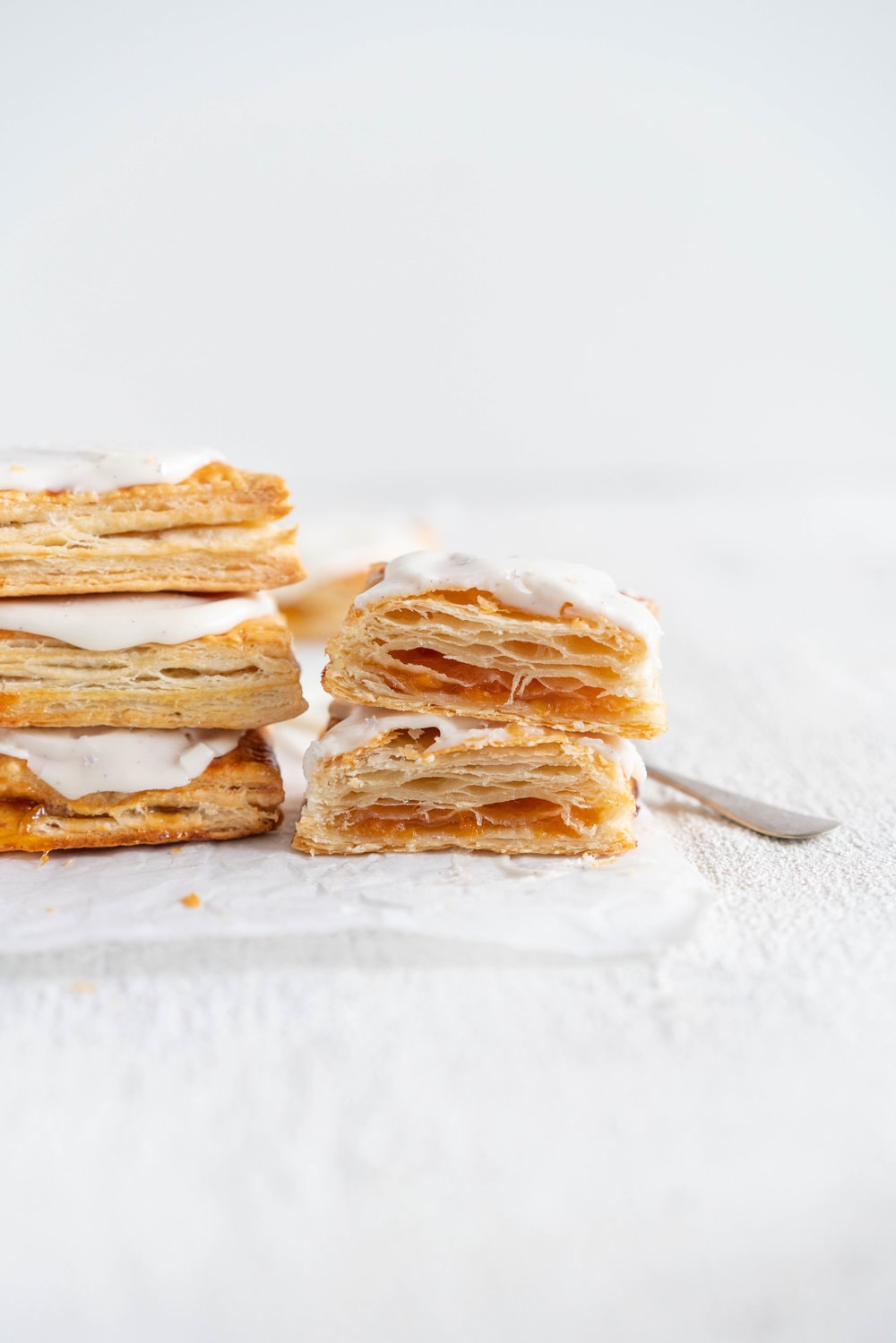 Apricot Pop Tarts with Vanilla Bean Icing - a quick apricot jam is enclosed in a buttery, flaky puff pastry, before being finished off with a vanilla bean icing. #poptart #pastry #apricot #jam #apricotjam #vanillabean