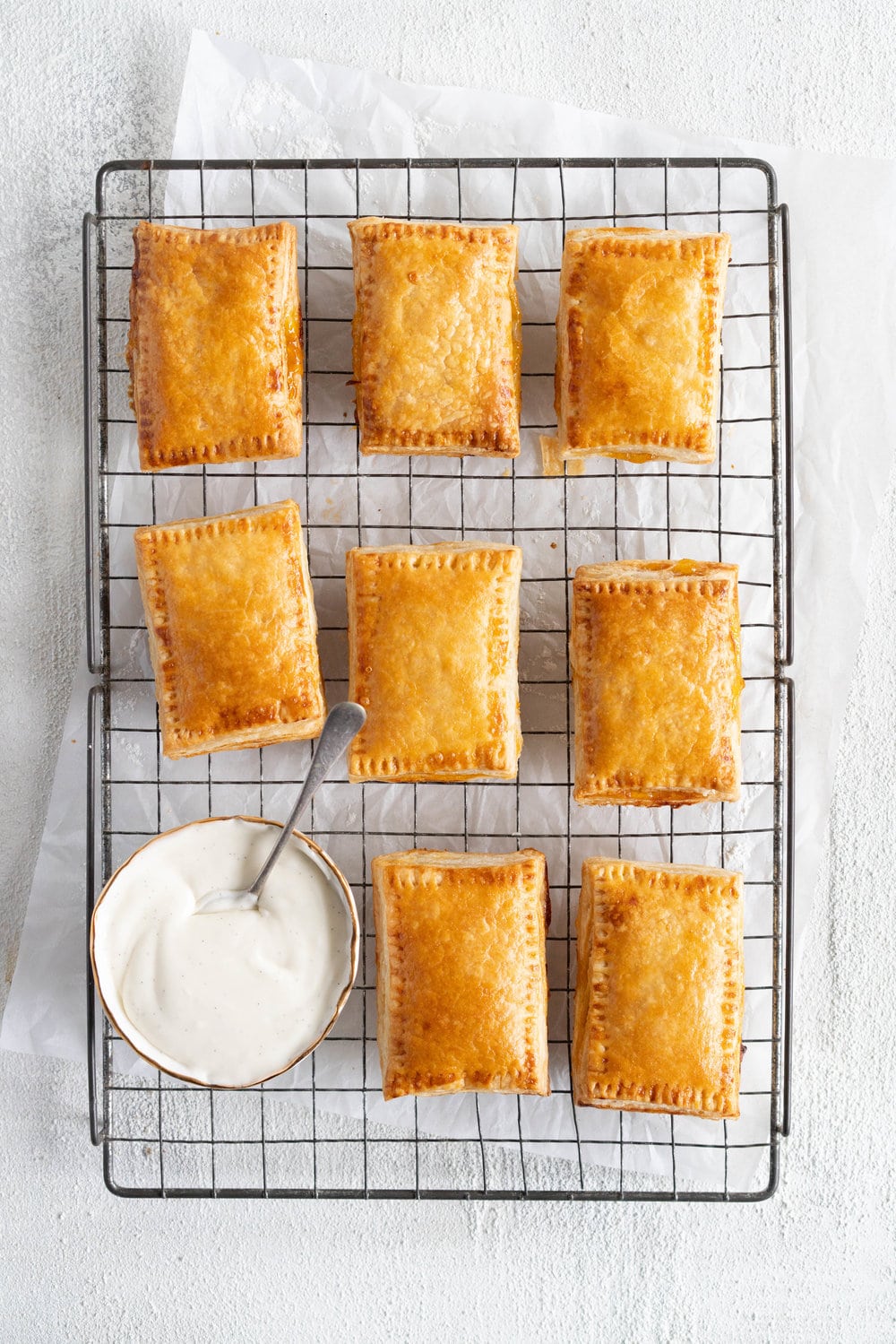 Apricot Pop Tarts with Vanilla Bean Icing - a quick apricot jam is enclosed in a buttery, flaky puff pastry, before being finished off with a vanilla bean icing. #poptart #pastry #apricot #jam #apricotjam #vanillabean