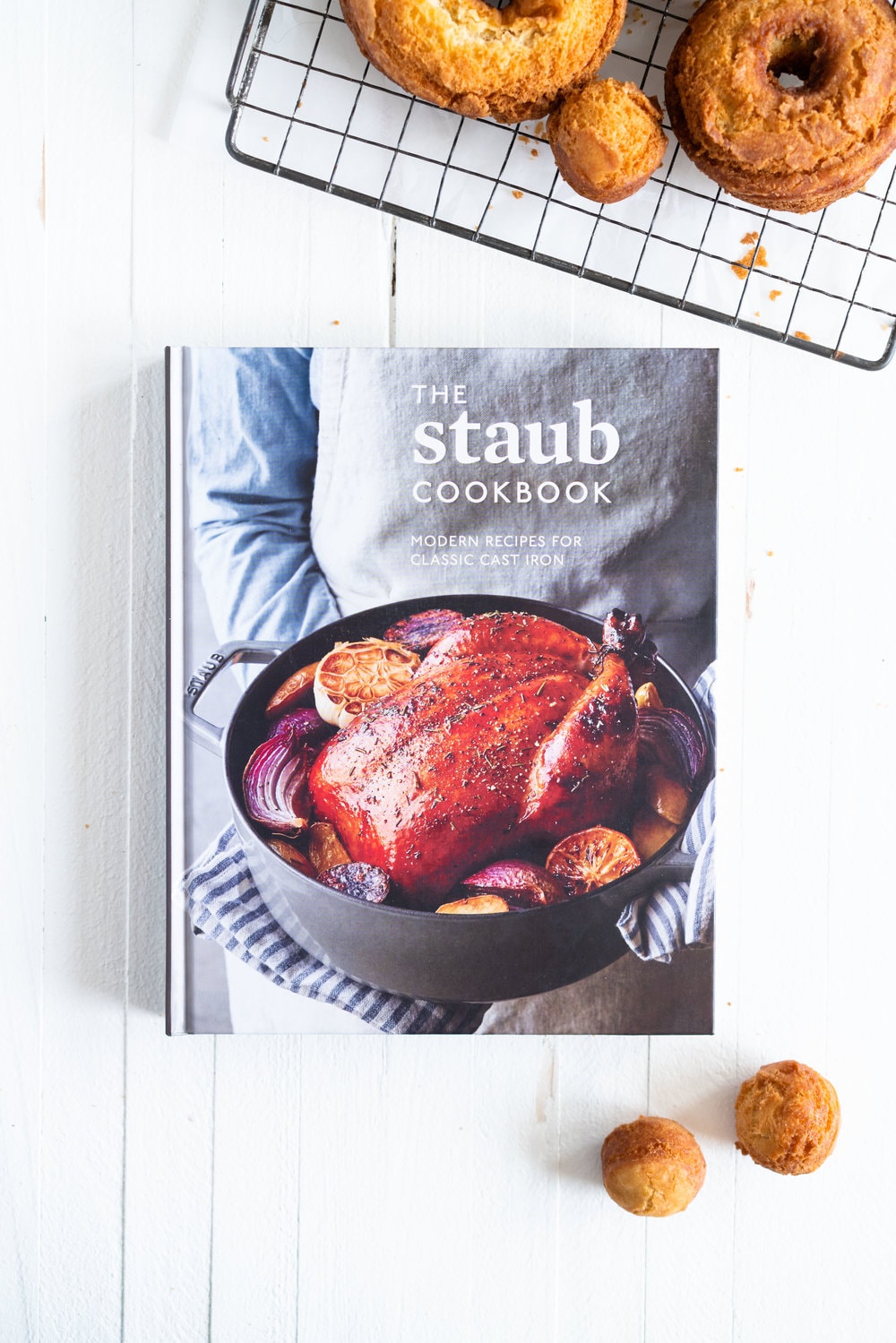 Vanilla Bean Old Fashioned Doughnuts - made as a cake doughnut rather than it's friend the yeast raised doughnut, old fashioned doughnuts are cakey and dense, fried to golden perfection, and then finished with a vanilla bean glaze. #oldfashioned #doughnuts #cakedoughnuts #cakedonut #vanillabean #staub