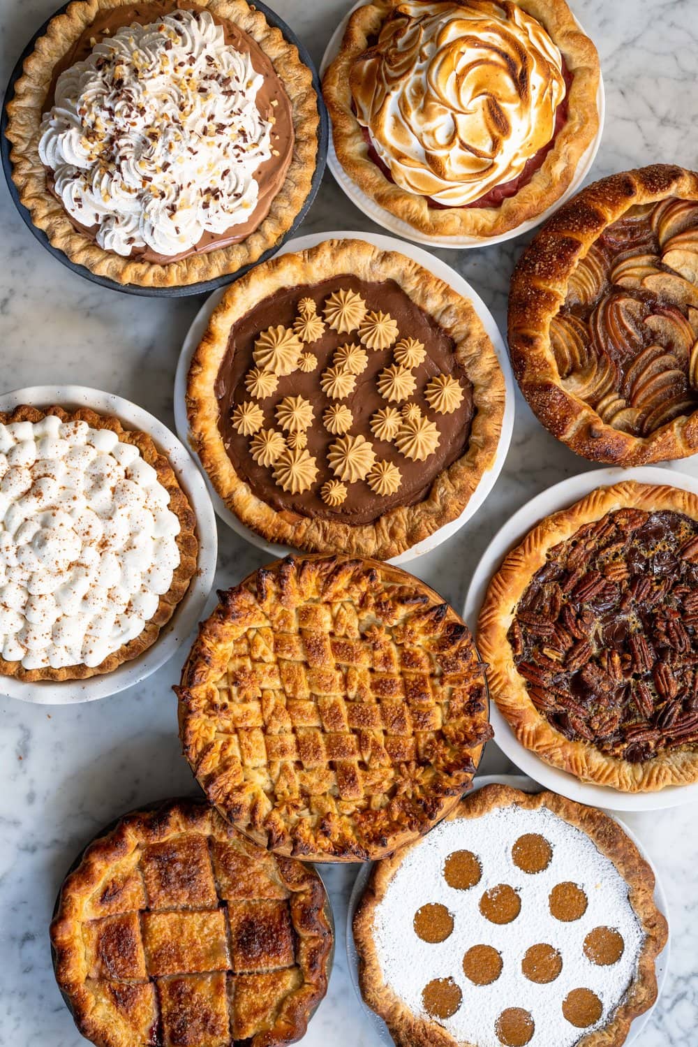 Nine of the Best Thanksgiving Pie Recipes: the Ultimate Pie Roundup Post! This roundup post lists some of the best thanksgiving pie recipes - there is literally something for everyone. Make just one or mix and match for the ultimate thanksgiving pie spread. #thanksgiving #pierecipes #roundup