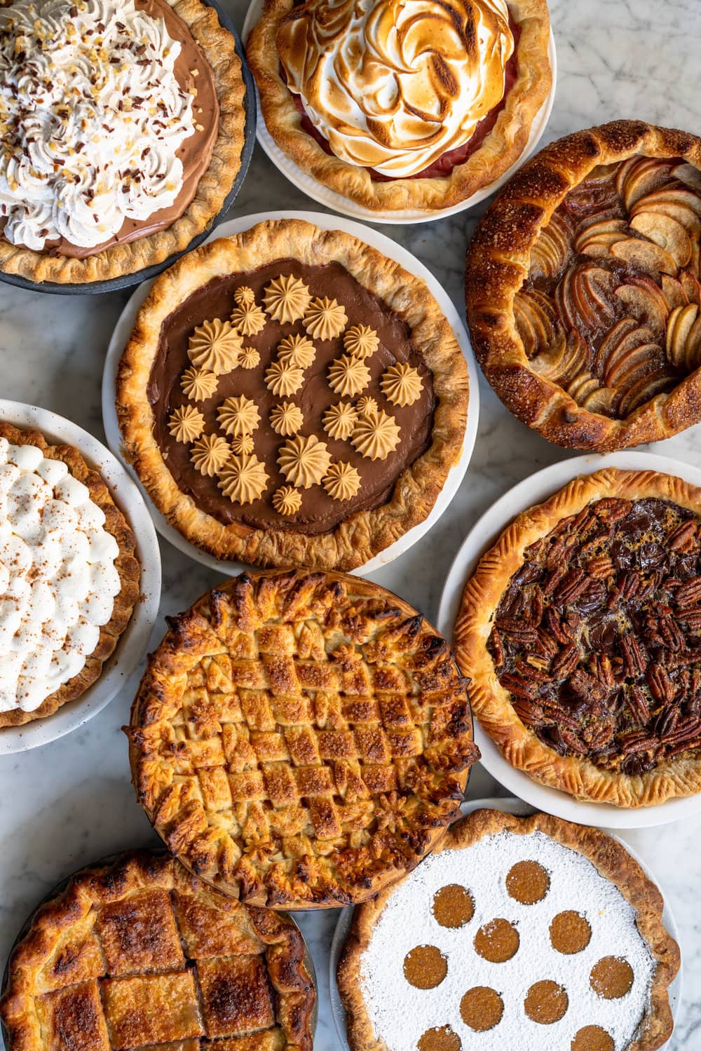 Nine of the Best Thanksgiving Pie Recipes: the Ultimate Pie Roundup Post! This roundup post lists some of the best thanksgiving pie recipes - there is literally something for everyone. Make just one or mix and match for the ultimate thanksgiving pie spread. #thanksgiving #pierecipes #roundup