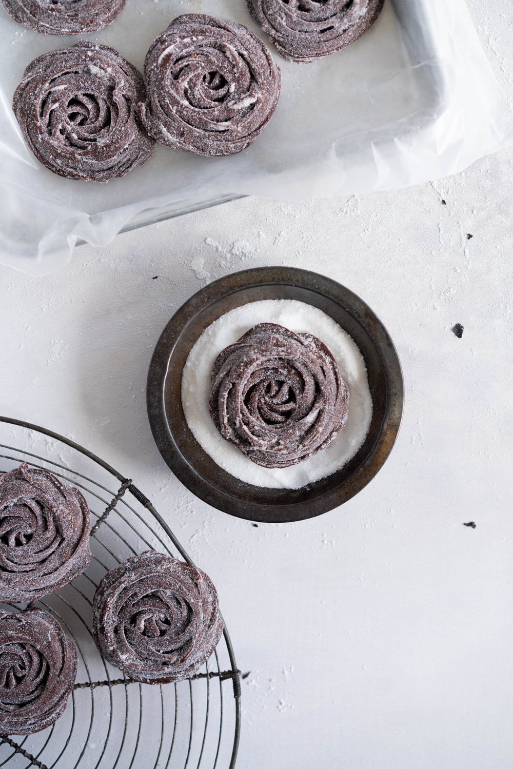 Chocolate Choux Ice Cream Sandwiches with Double Chocolate Ice Cream. The ultimate ice cream sandwich - homemade, rich chocolate ice cream is sandwiched by two light and crispy chocolate choux doughnuts. A simple but indulgent treat. #cruller #icecreamsandwich #choux