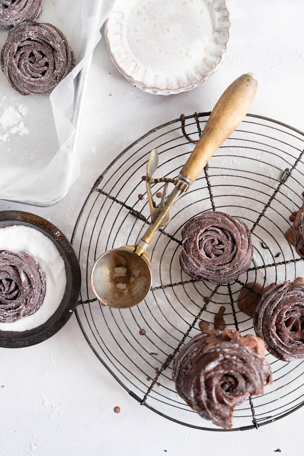 Chocolate Choux Ice Cream Sandwiches with Double Chocolate Ice Cream. The ultimate ice cream sandwich - homemade, rich chocolate ice cream is sandwiched by two light and crispy chocolate choux doughnuts. A simple but indulgent treat. #cruller #icecreamsandwich #choux