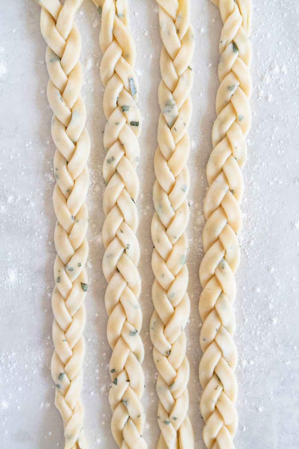 Sage Salted Caramel Apple Pie with Fresh Sage Crust - Flaky pie dough flecked with fresh sage holds an apple filling, topped with a sage salted caramel. A perfect twist on the classic salted caramel apple pie.