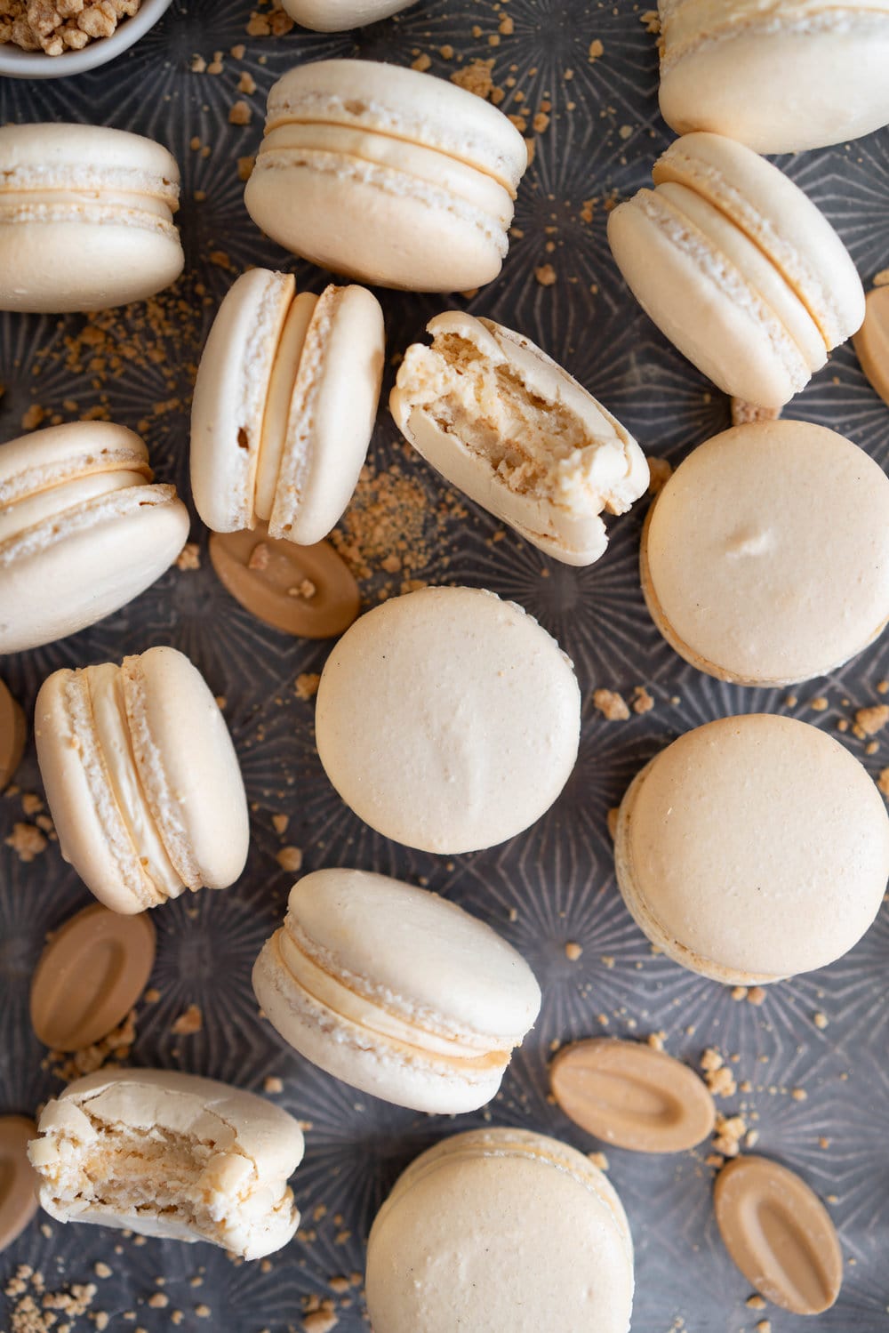 Toasted Sugar Vanilla Bean Macaron shells are sandwiched with a silky, creamy German buttercream loaded with caramelised white chocolate, Subtle elevated flavours makes this a perfect simple recipe that is sure to wow your friends or make the perfect treat or gift. #frenchmacaron #macaronrecipe