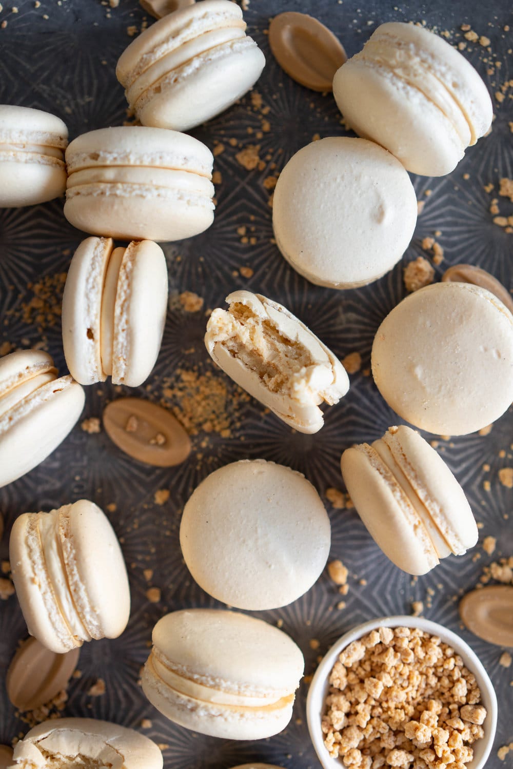 Toasted Sugar Vanilla Bean Macaron shells are sandwiched with a silky, creamy German buttercream loaded with caramelised white chocolate, Subtle elevated flavours makes this a perfect simple recipe that is sure to wow your friends or make the perfect treat or gift. #frenchmacaron #macaronrecipe