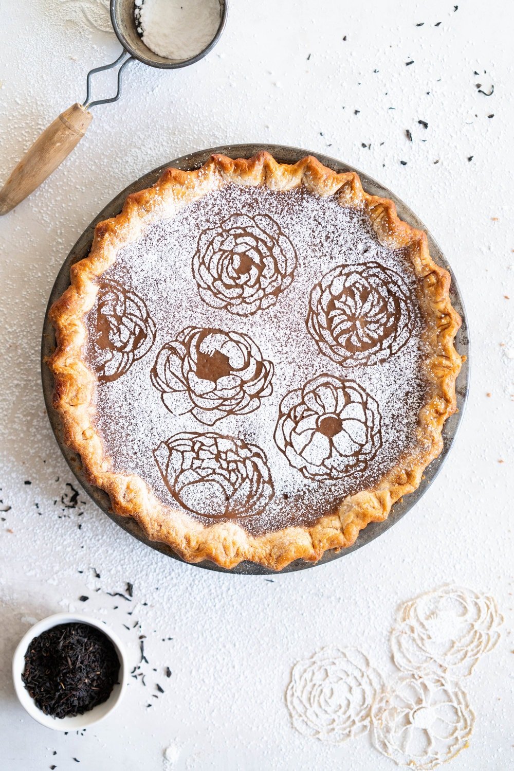 Earl Grey Sugar Pie - Fragrant Earl grey custard is spiked with vanilla bean, and finished with a hefty dusting of powdered sugar. An egg free version of a custard favourite that bakes perfectly flat and will never crack on you.