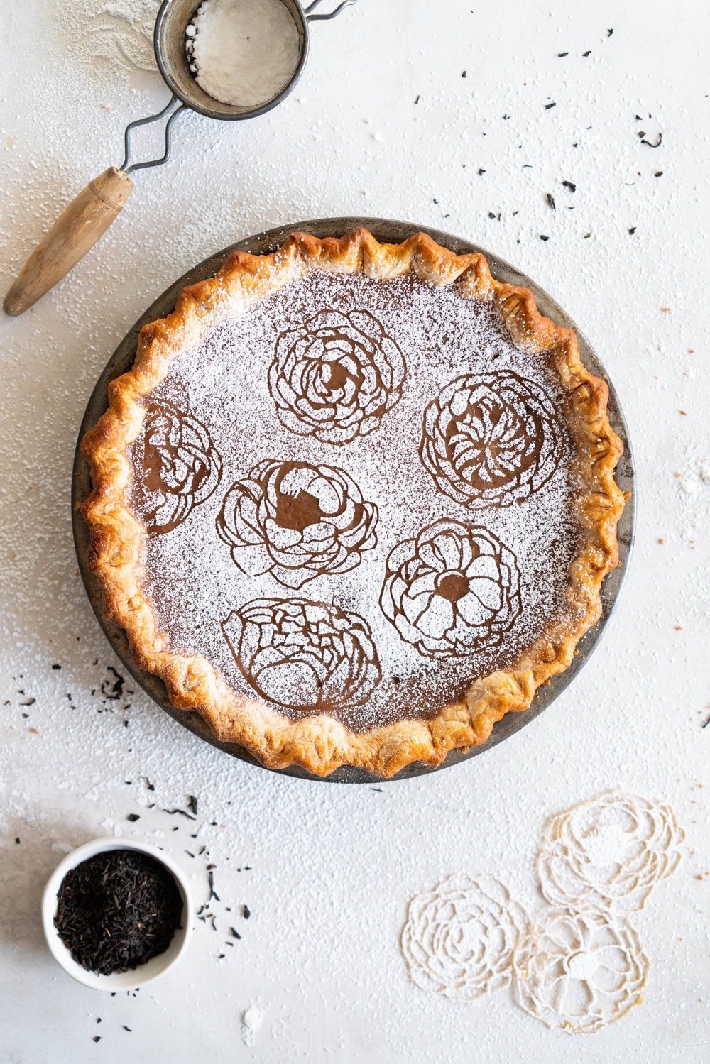 Earl Grey Sugar Pie - Fragrant Earl grey custard is spiked with vanilla bean, and finished with a hefty dusting of powdered sugar. An egg free version of a custard favourite that bakes perfectly flat and will never crack on you.