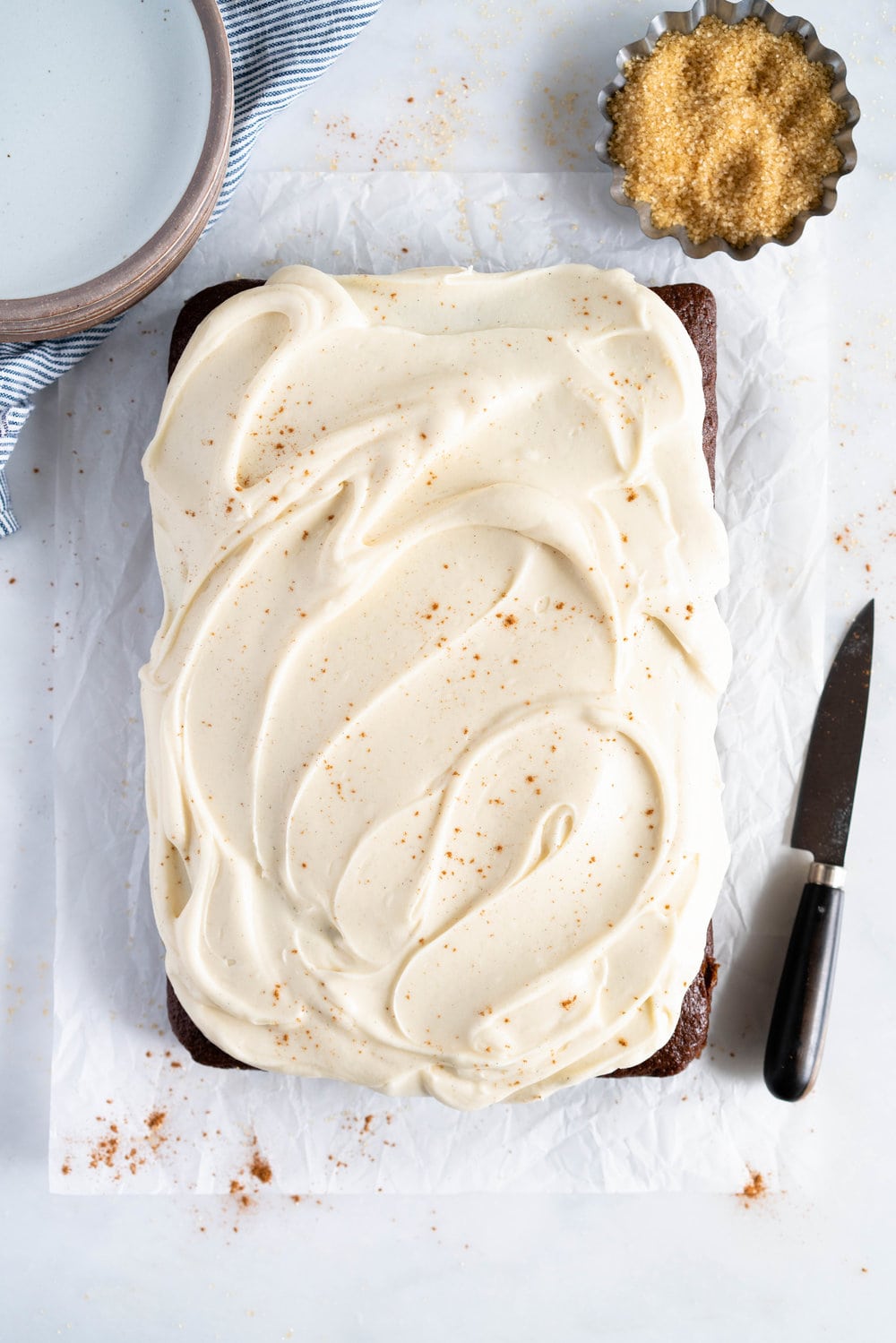 Gingerbread Sheet Cake with Maple Cream Cheese Frosting - a warming spiced cake, topped with a silky, maple, ream cheese frosting. A super simple yet delicious cake, perfect for feeding a crowd or for a quick holiday pick me up.