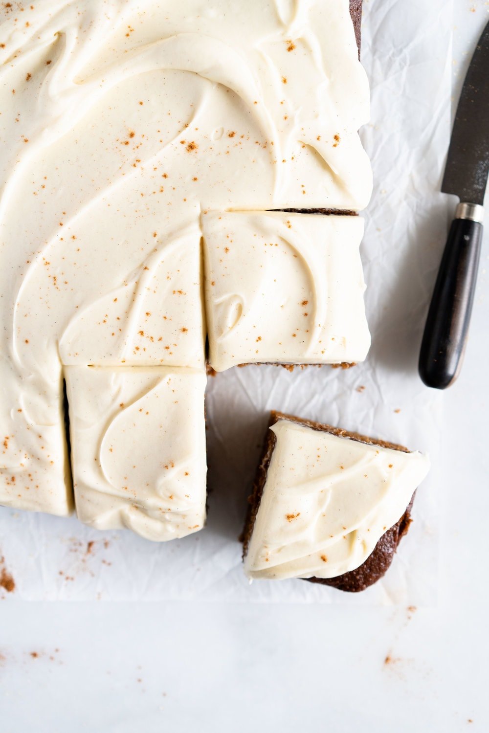 Gingerbread Sheet Cake with Maple Cream Cheese Frosting - a warming spiced cake, topped with a silky, maple, ream cheese frosting. A super simple yet delicious cake, perfect for feeding a crowd or for a quick holiday pick me up.