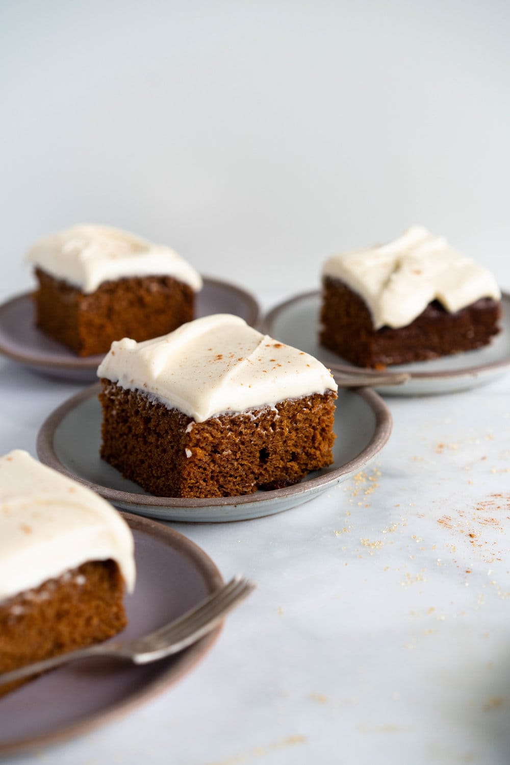 Gingerbread Sheet Cake with Maple Cream Cheese Frosting - a warming spiced cake, topped with a silky, maple, ream cheese frosting. A super simple yet delicious cake, perfect for feeding a crowd or for a quick holiday pick me up.