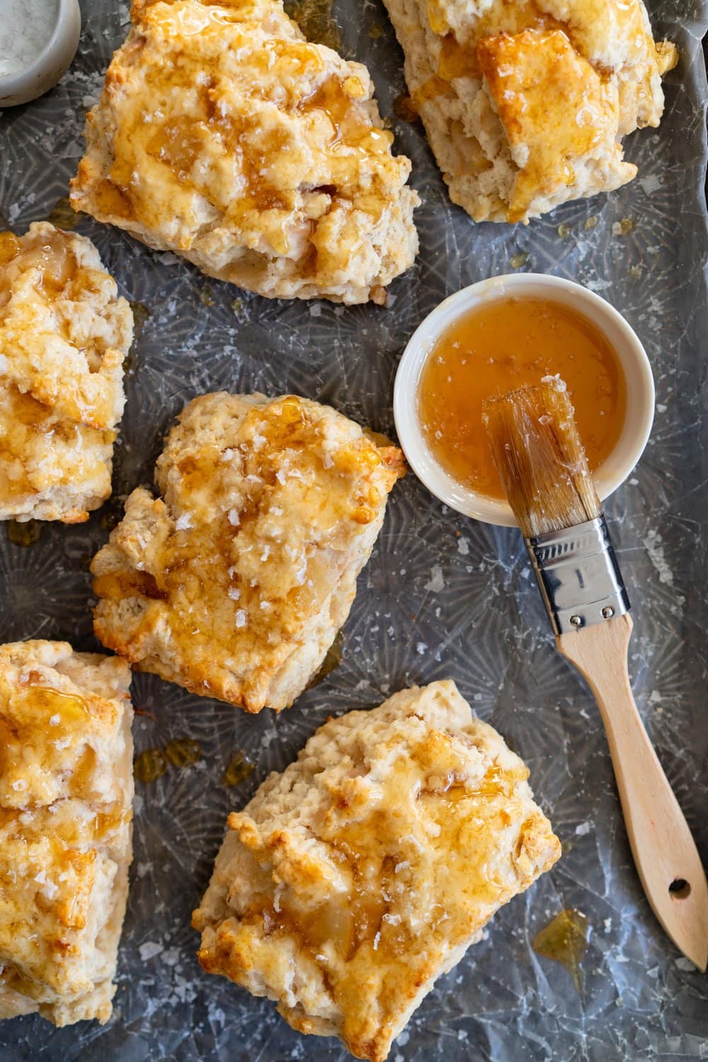Roasted Pear and Vanilla Bean Scones with Salty Honey Glaze - Giant Craggy Scones filled with pear chunks held together with tender scone dough, and finished with a sticky honey glaze and a generous dose of flaky sea salt.