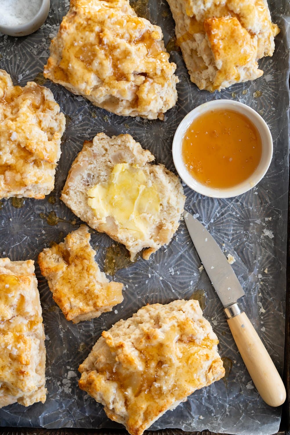 Roasted Pear and Vanilla Bean Scones with Salty Honey Glaze - Giant Craggy Scones filled with pear chunks held together with tender scone dough, and finished with a sticky honey glaze and a generous dose of flaky sea salt.