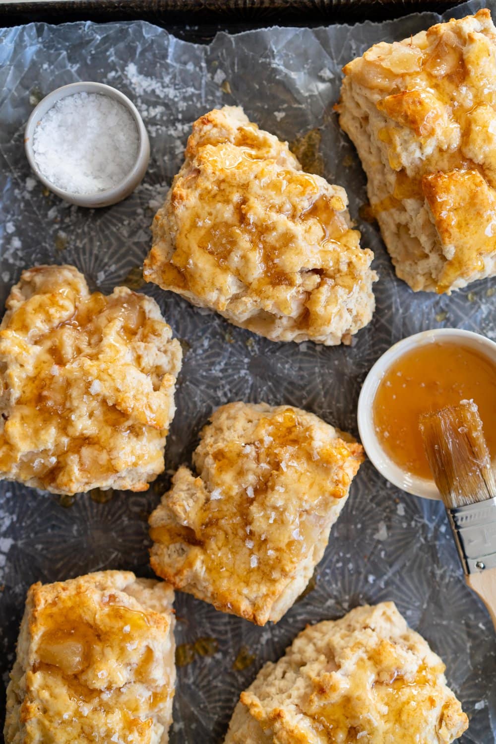 Roasted Pear and Vanilla Bean Scones with Salty Honey Glaze - Giant Craggy Scones filled with pear chunks held together with tender scone dough, and finished with a sticky honey glaze and a generous dose of flaky sea salt.