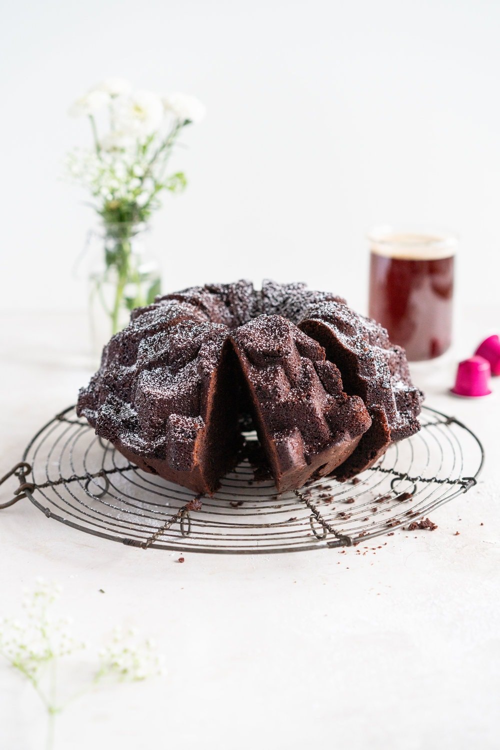 Nutella Chocolate Bundt Cake - this easy stir together bundt cake would be perfect for Mother's day or for any time that you need a sweet treat. It comes together super quickly, and is the perfect density thanks to the sour cream and nutella in the recipe. No mixer required - this one is a total crowd pleaser. #nutella #chocolatebundt #bundtcake