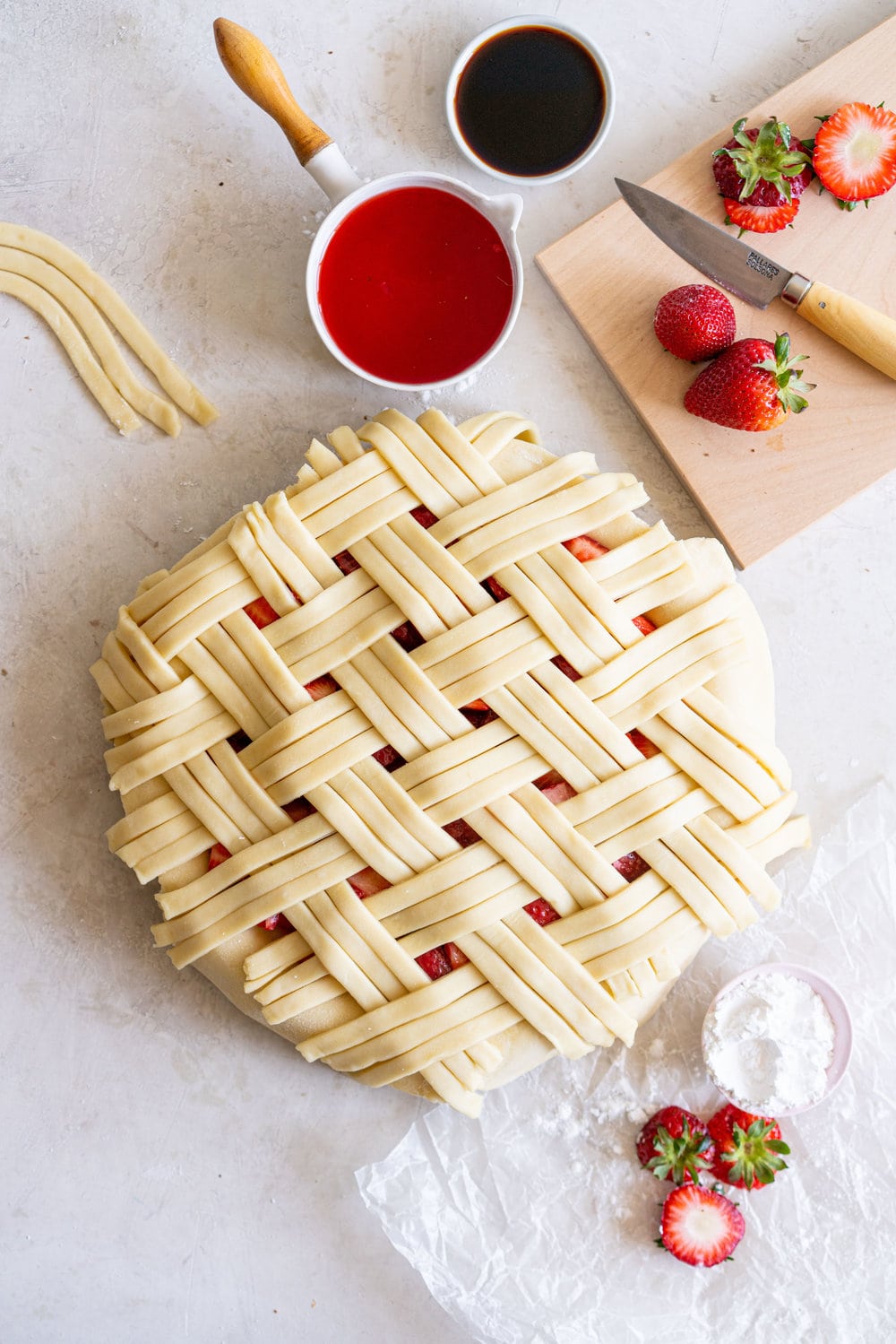 Strawberry Balsamic Pie - sweet strawberries are balanced out by Balsamic Vinegar, then wrapped up in a super flaky pie crust. Strawberry pie is the perfect summer dessert, is easy to make, and is ideal for taking along to an evening bbq or gathering. #strawberrypie #strawberrybalsamic #summerpie