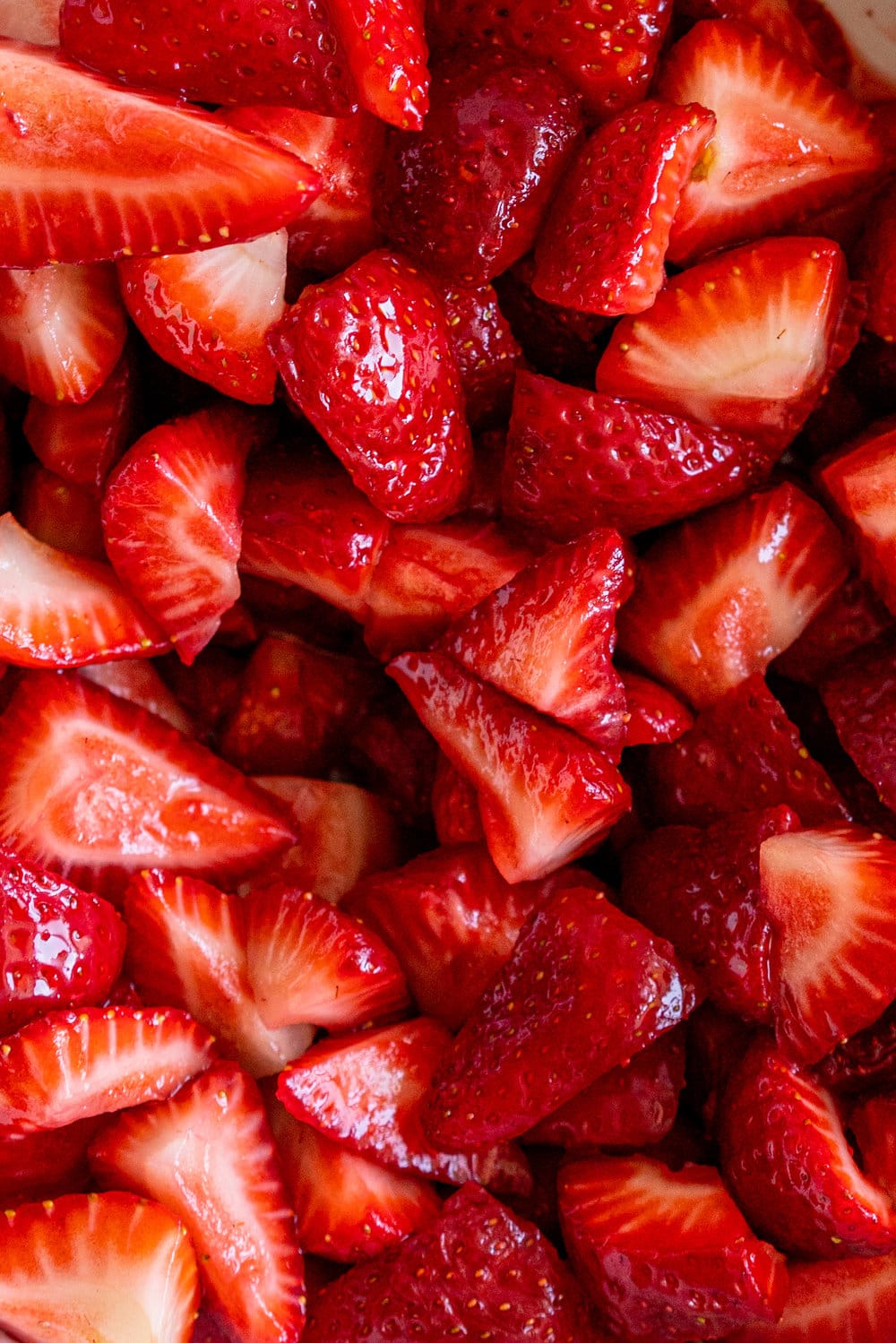 Strawberry Balsamic Pie - sweet strawberries are balanced out by Balsamic Vinegar, then wrapped up in a super flaky pie crust. Strawberry pie is the perfect summer dessert, is easy to make, and is ideal for taking along to an evening bbq or gathering. #strawberrypie #strawberrybalsamic #summerpie