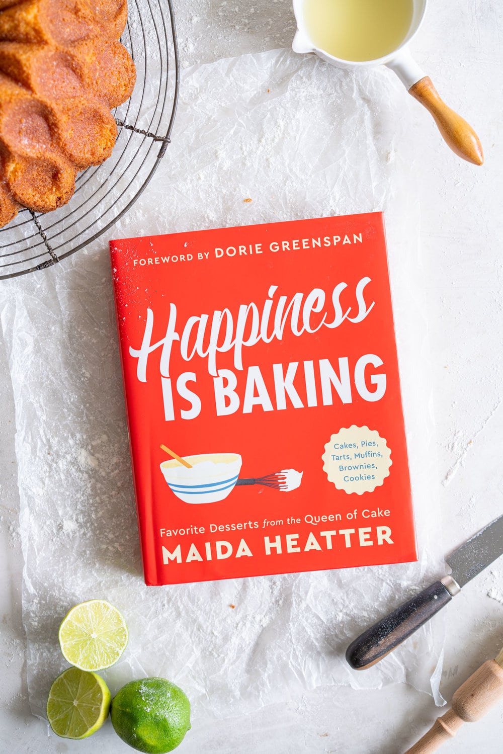 Maida Heatter's East 62nd Street Lemon Cake (Lemon and Lime Bundt Cake). This recipe comes from the legendary Maida Heatter's latest book, Happiness is baking. It is a tender crumbed lemon cake, brushed with a crunchy sugary glaze. Incredibly easy and so, so delicious. #maidaheatter #lemoncake #bundtcake