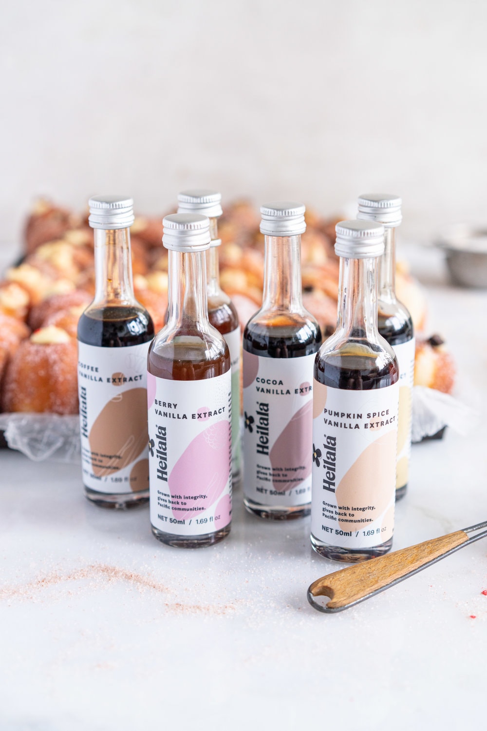 Perfectly fluffy mini brioche doughnuts are fried to perfection, rolled in sugar, and filled with flavoured pastry cream. A whole tray of mini doughnuts would be perfect for a special occasion or gathering, as they are a hit with all ages! #doughnut #briochedoughnut