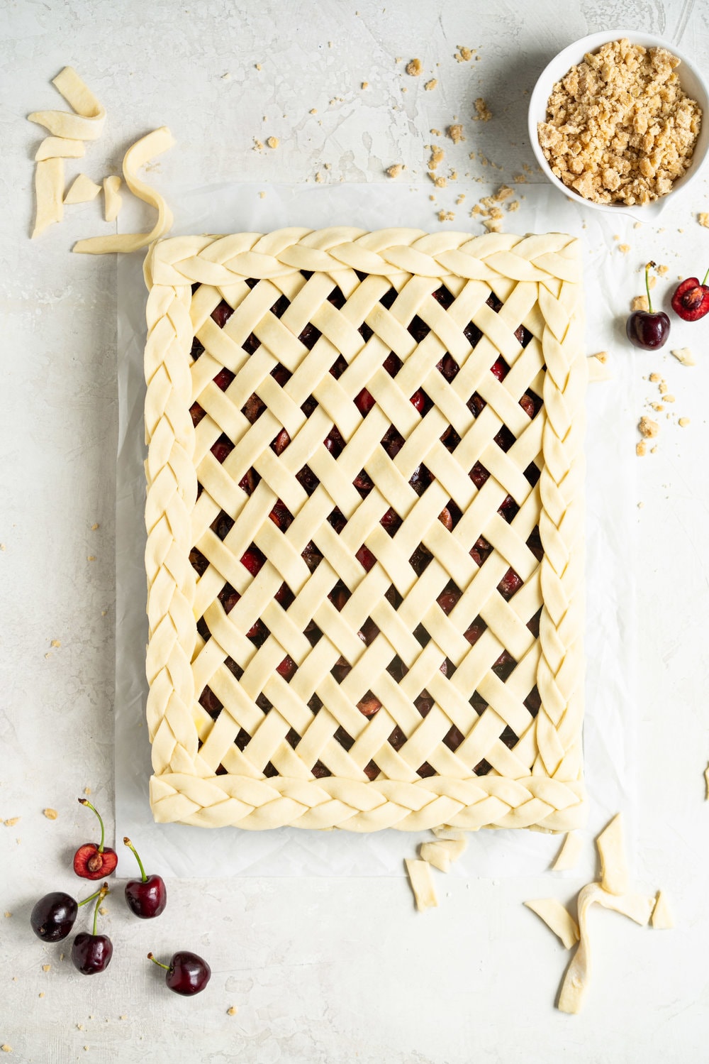 Cherry Slab Pie with Brown Butter Oat Streusel - a thick cherry slab pie is topped with a layer of flaky pastry and finished with a brown butter oat streusel that gives the most perfect crunch. #slabpie #streusel #cherrypie #cherryslabpie